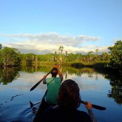Madagascar canoeing on river