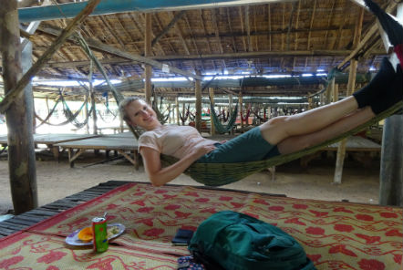 Volunteer chilling in a hammock