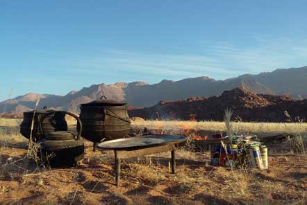 Outdoor stoves with mountains in background 