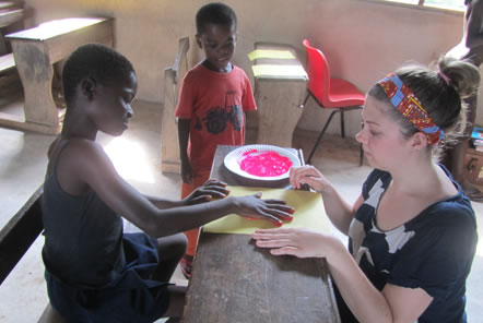 Sarah painting with the children