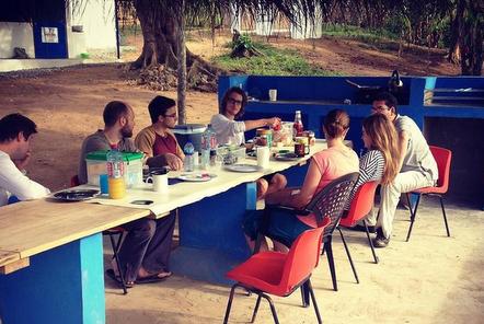 Volunteers in Ghana at meal time