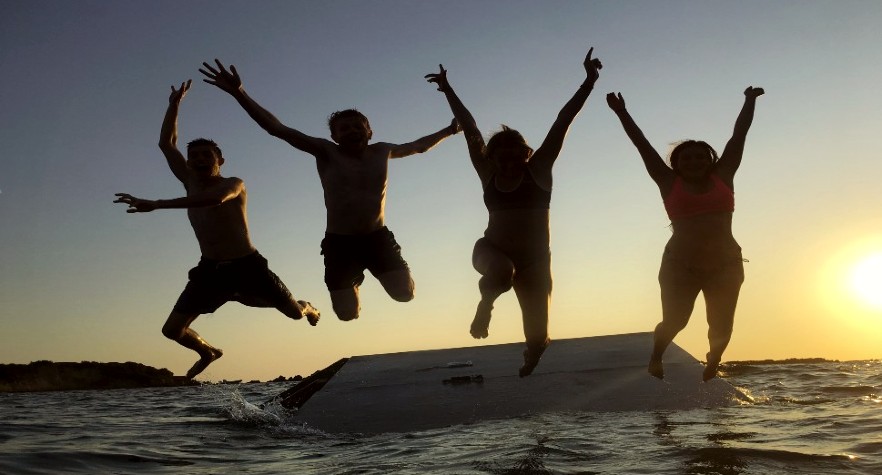 volunteers jumping