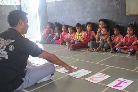 Ravi leading an activity session at a day care centre