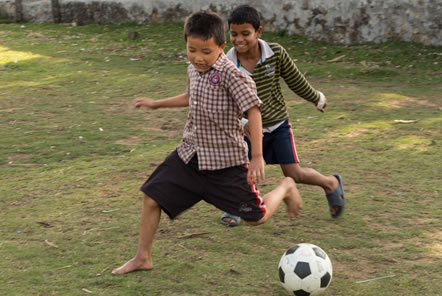 Street Children playing football