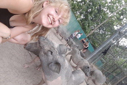 Sophie with the pigs