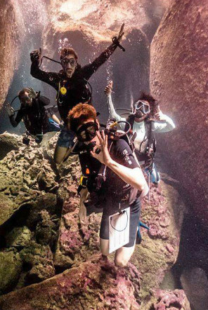 Divers in a cave in Thailand