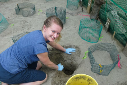 Lucy from the Pod Volunteer team doing excavation duty